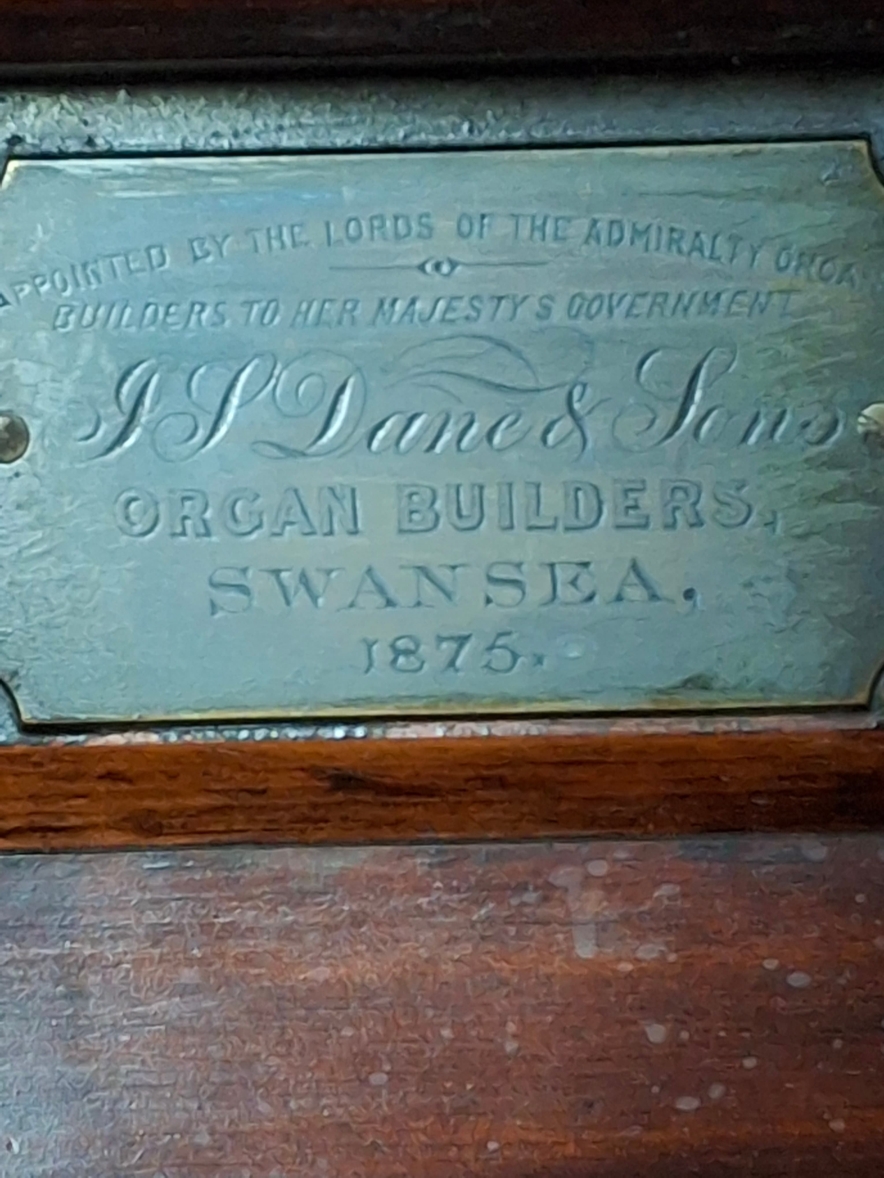The maker's plate from J S Dane and Sons of Swansea