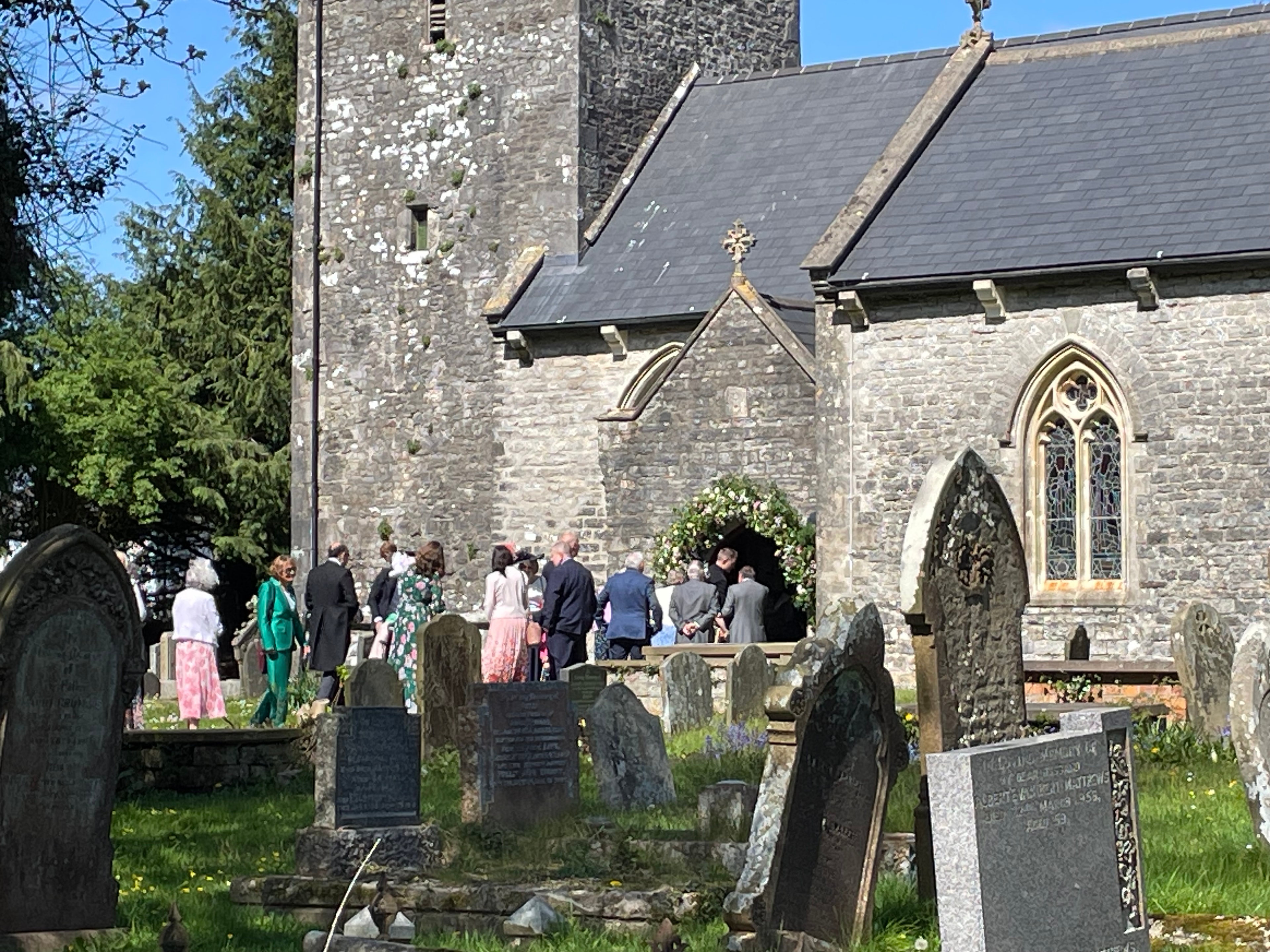 Wedding congregation gathering outside St Nicholas Church